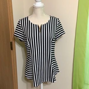 Alyx L black and white striped form fitting v neck blouse with metal detail